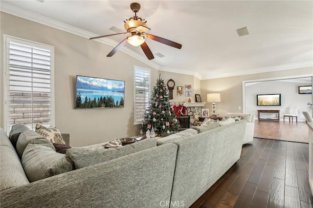 living room featuring crown molding, ceiling fan, and dark wood-type flooring