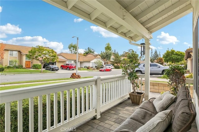 balcony featuring covered porch