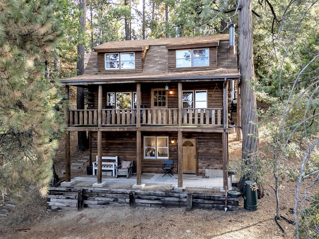 view of front of house featuring a patio