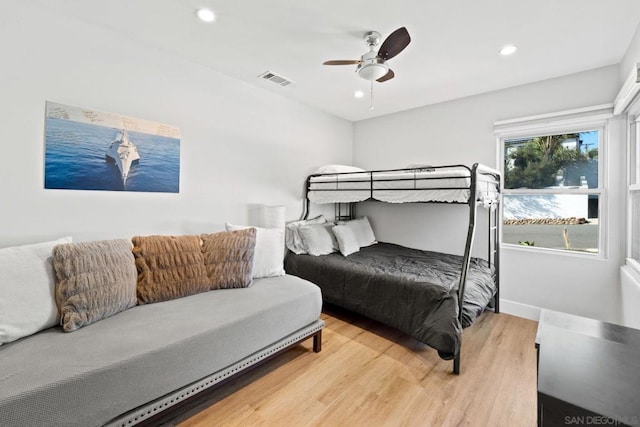 bedroom featuring ceiling fan and light wood-type flooring