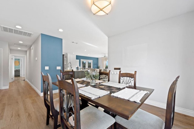 dining area featuring light hardwood / wood-style floors