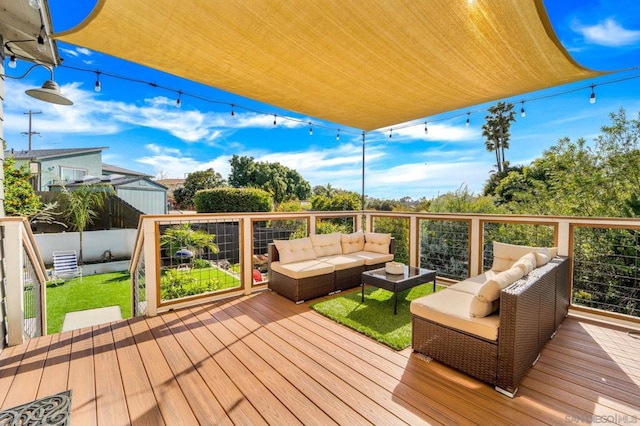 wooden deck with outdoor lounge area