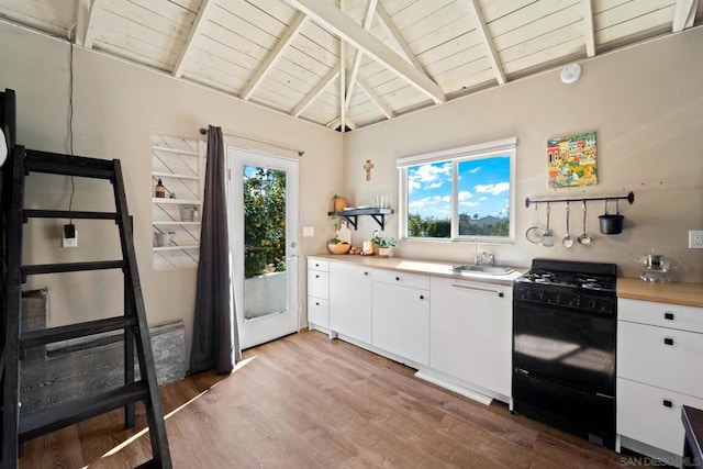 kitchen featuring gas stove, wooden ceiling, light hardwood / wood-style flooring, and lofted ceiling with beams