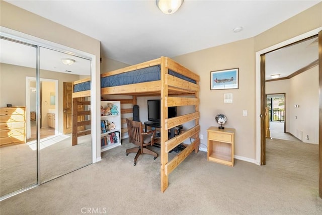 bedroom with light carpet