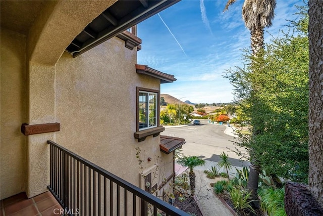 view of home's exterior with a mountain view