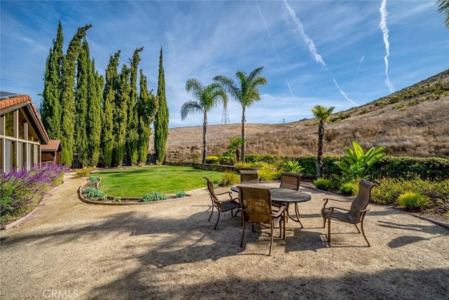 view of patio featuring a mountain view