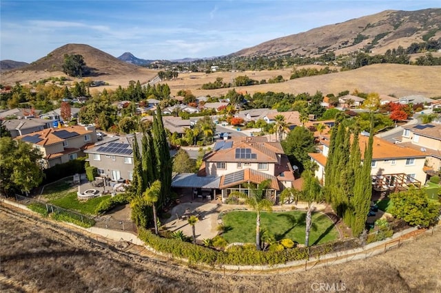 drone / aerial view featuring a mountain view