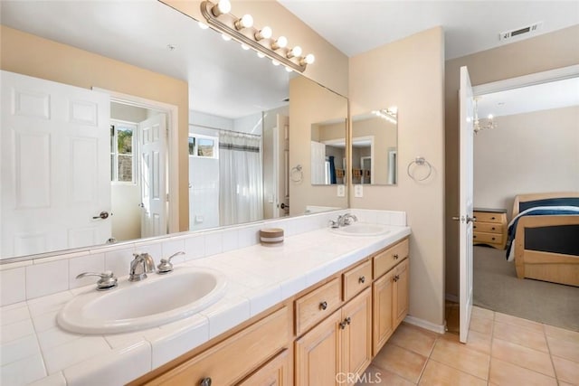 bathroom featuring vanity and tile patterned floors