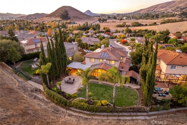 aerial view at dusk with a mountain view