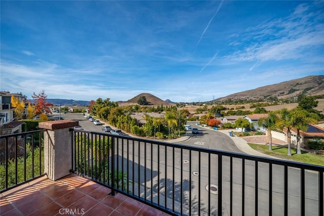 balcony featuring a mountain view