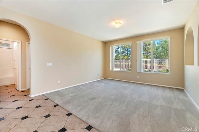 view of carpeted spare room