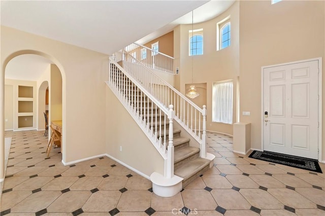 entrance foyer with a chandelier