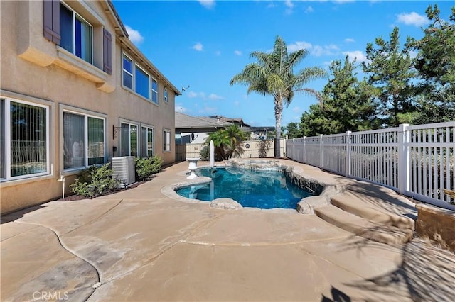 view of pool featuring central air condition unit and a patio