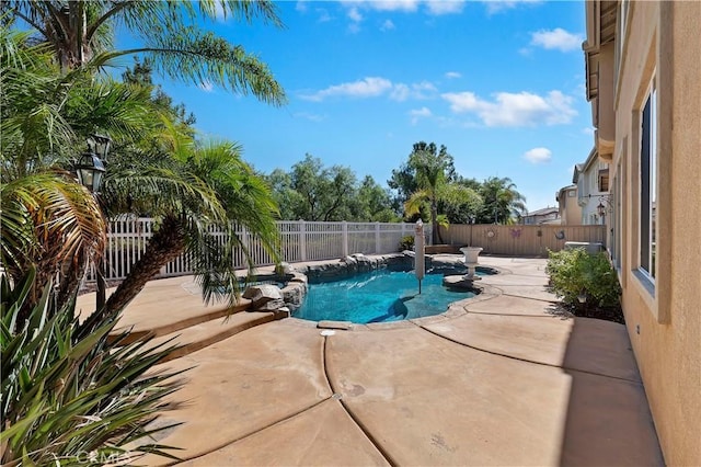 view of pool featuring a patio