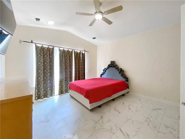 bedroom with lofted ceiling, marble finish floor, visible vents, and baseboards