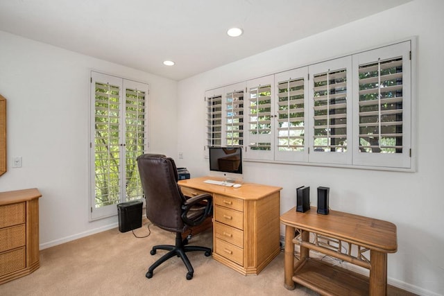 home office with light colored carpet