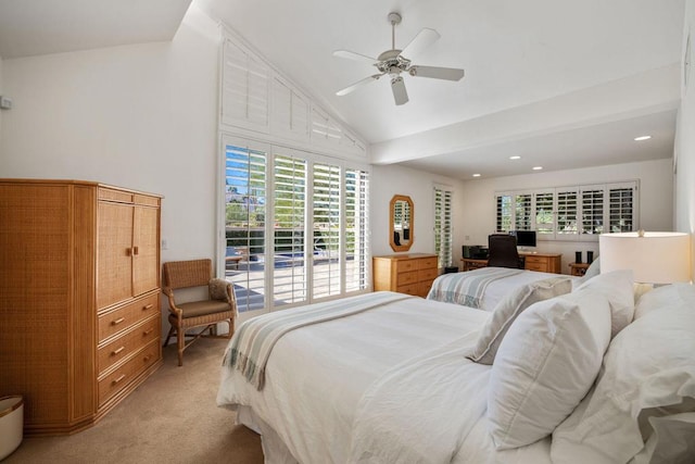 bedroom featuring light carpet, ceiling fan, and lofted ceiling