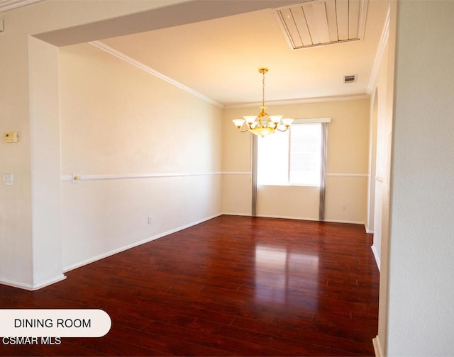 unfurnished room with a notable chandelier, crown molding, and dark wood-type flooring