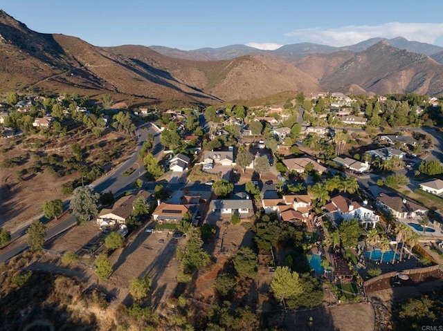 drone / aerial view featuring a mountain view