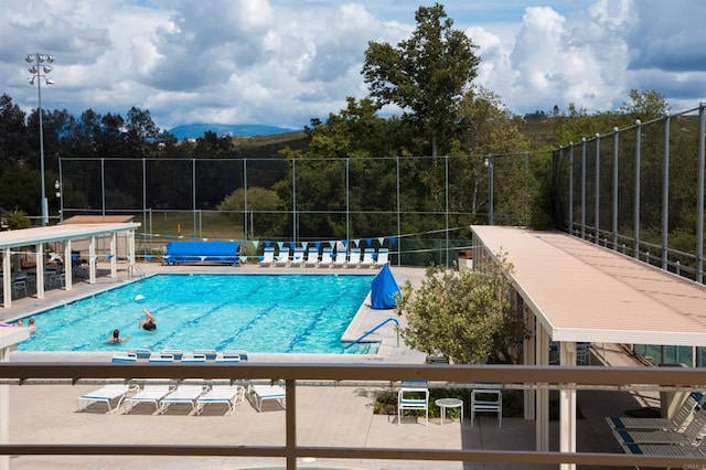 view of swimming pool featuring a patio