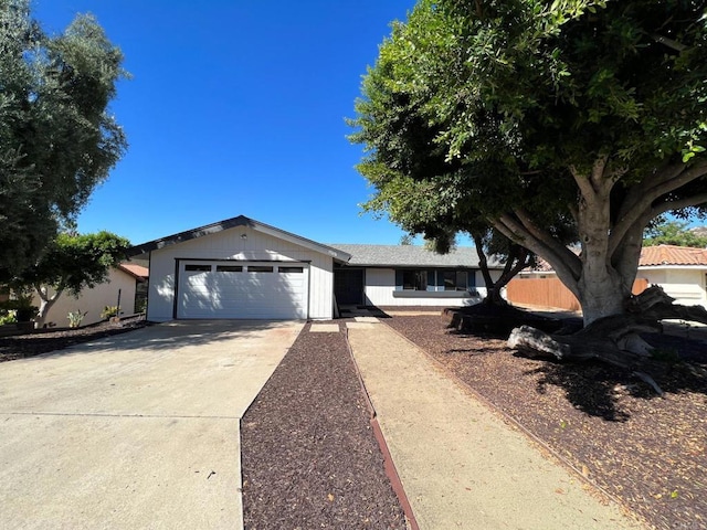 single story home featuring a garage