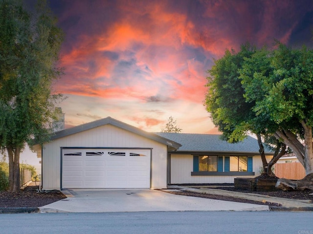 ranch-style house featuring a garage