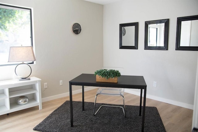 home office featuring light hardwood / wood-style flooring