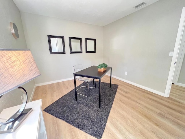 office with hardwood / wood-style floors