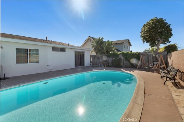 view of pool featuring a fenced backyard and a fenced in pool