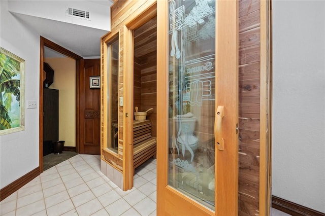 interior space featuring light tile patterned flooring