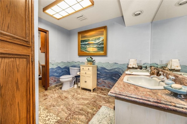 160 Yosemite Dr, Big Bear City, CA 92314 - bathroom featuring double vanity and toilet