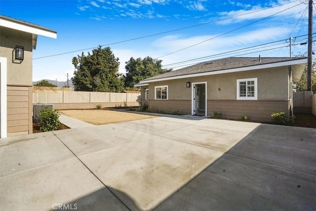 rear view of house featuring a patio