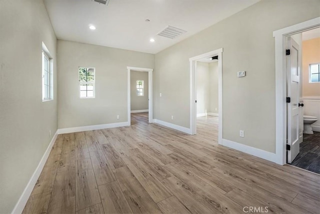 empty room featuring light hardwood / wood-style floors