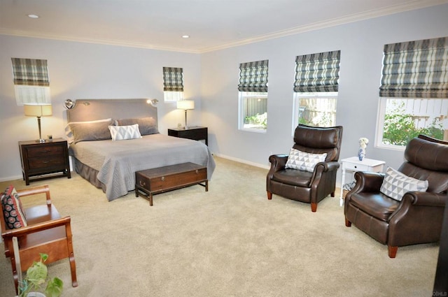 carpeted bedroom with ornamental molding