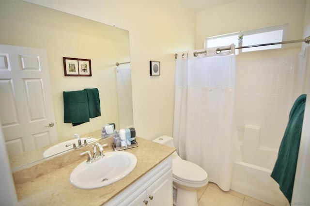 full bathroom featuring toilet, shower / bath combo, vanity, and tile patterned floors