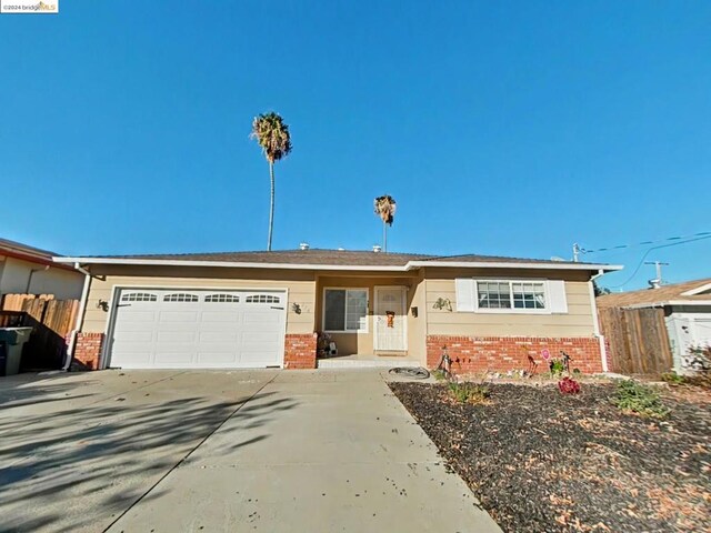 ranch-style home with a garage