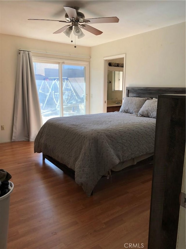 bedroom featuring hardwood / wood-style floors and ceiling fan