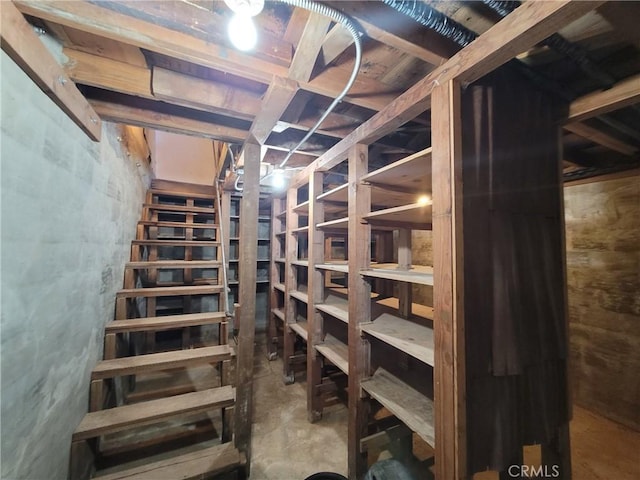 wine room featuring concrete flooring