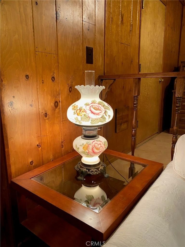 dining room featuring wooden walls