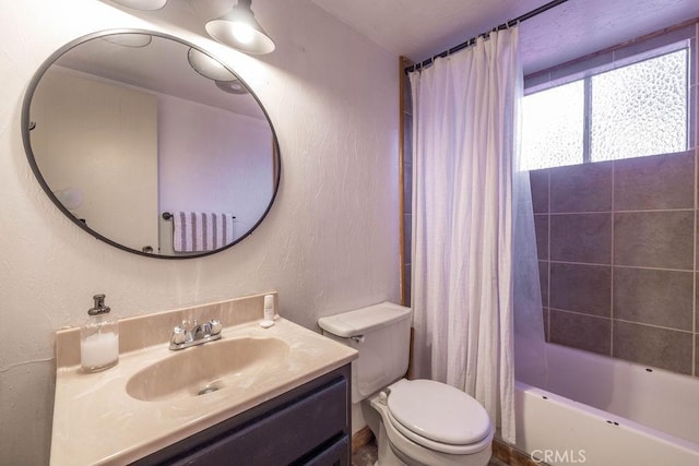 full bathroom featuring vanity, toilet, and shower / tub combo with curtain