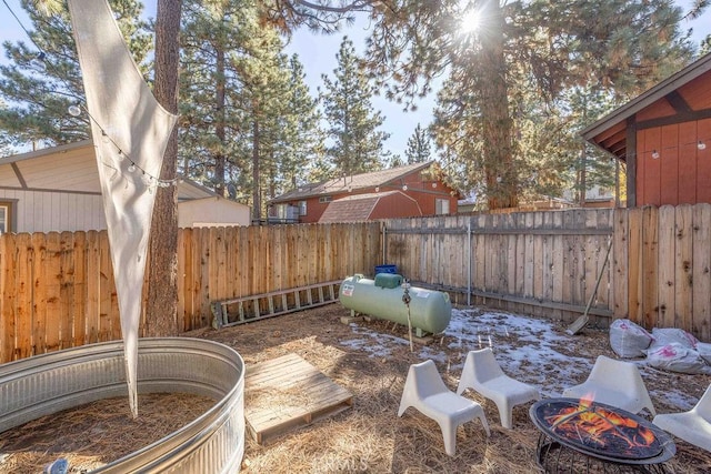 exterior space with a fire pit