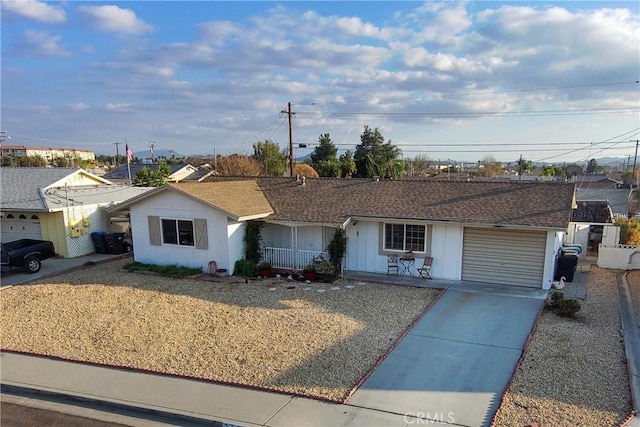 ranch-style house featuring a garage