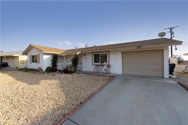 ranch-style home featuring a garage