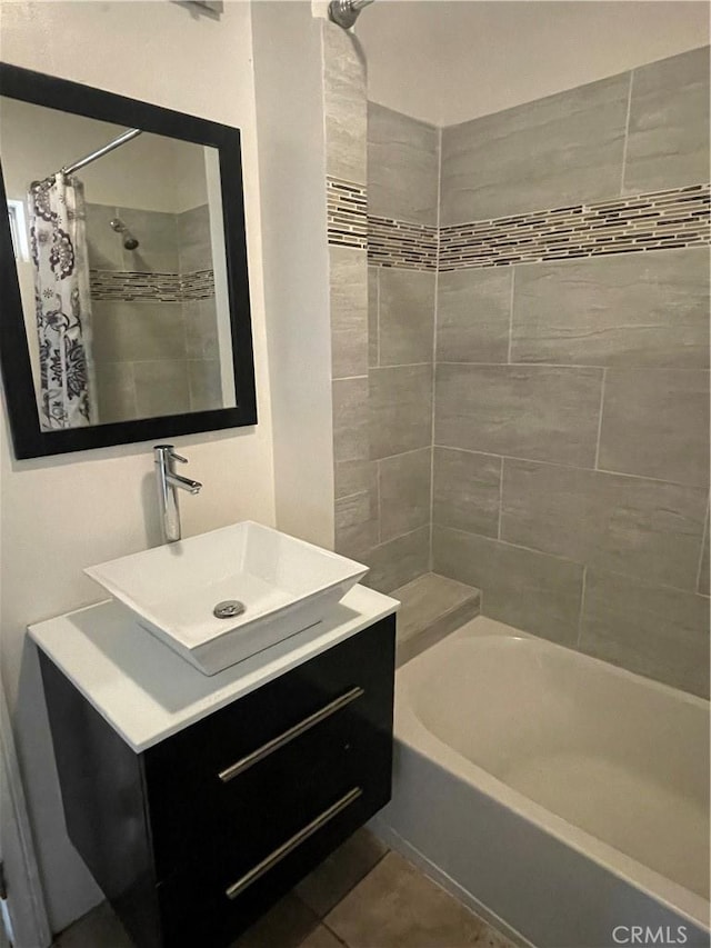 bathroom with vanity, tile patterned floors, and shower / bathtub combination with curtain