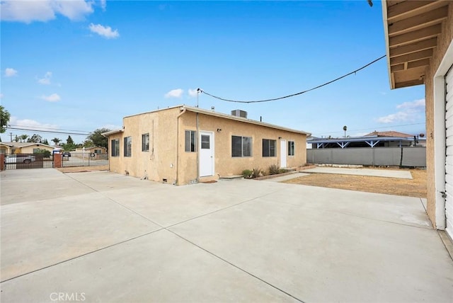 back of house featuring a patio area