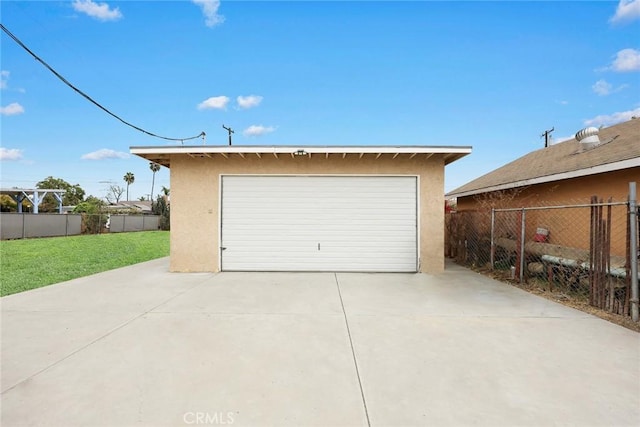 garage featuring a yard