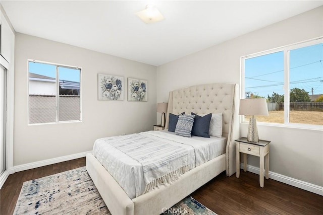 bedroom featuring dark wood-type flooring