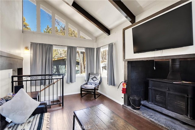 interior space with vaulted ceiling with beams