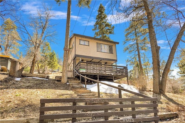 exterior space featuring a wooden deck