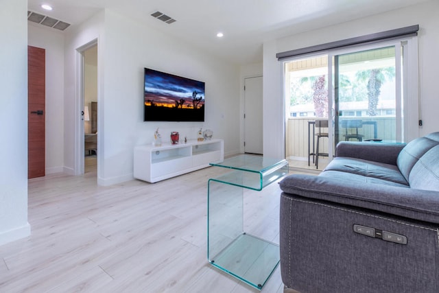 living room featuring light wood-type flooring